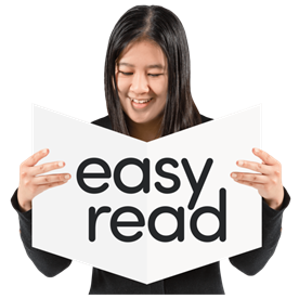 Woman reading a book that says Easy Read on it